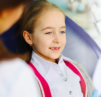 a girl with tooth loss