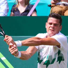 Milos Raonic playing tennis